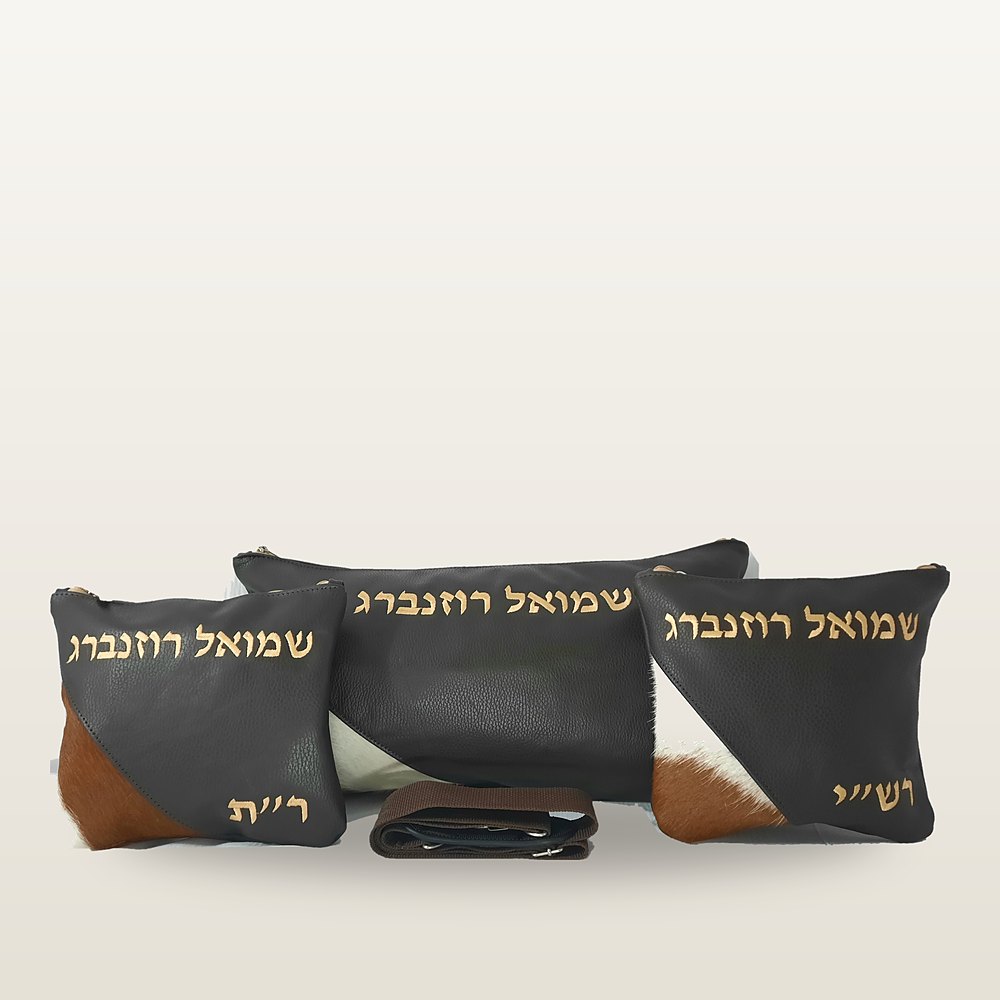 סט טלית ותפילין בעור כהה עם פינות פרוות עגל בחום-לבן, רקמה בזהב ורצועה חומה