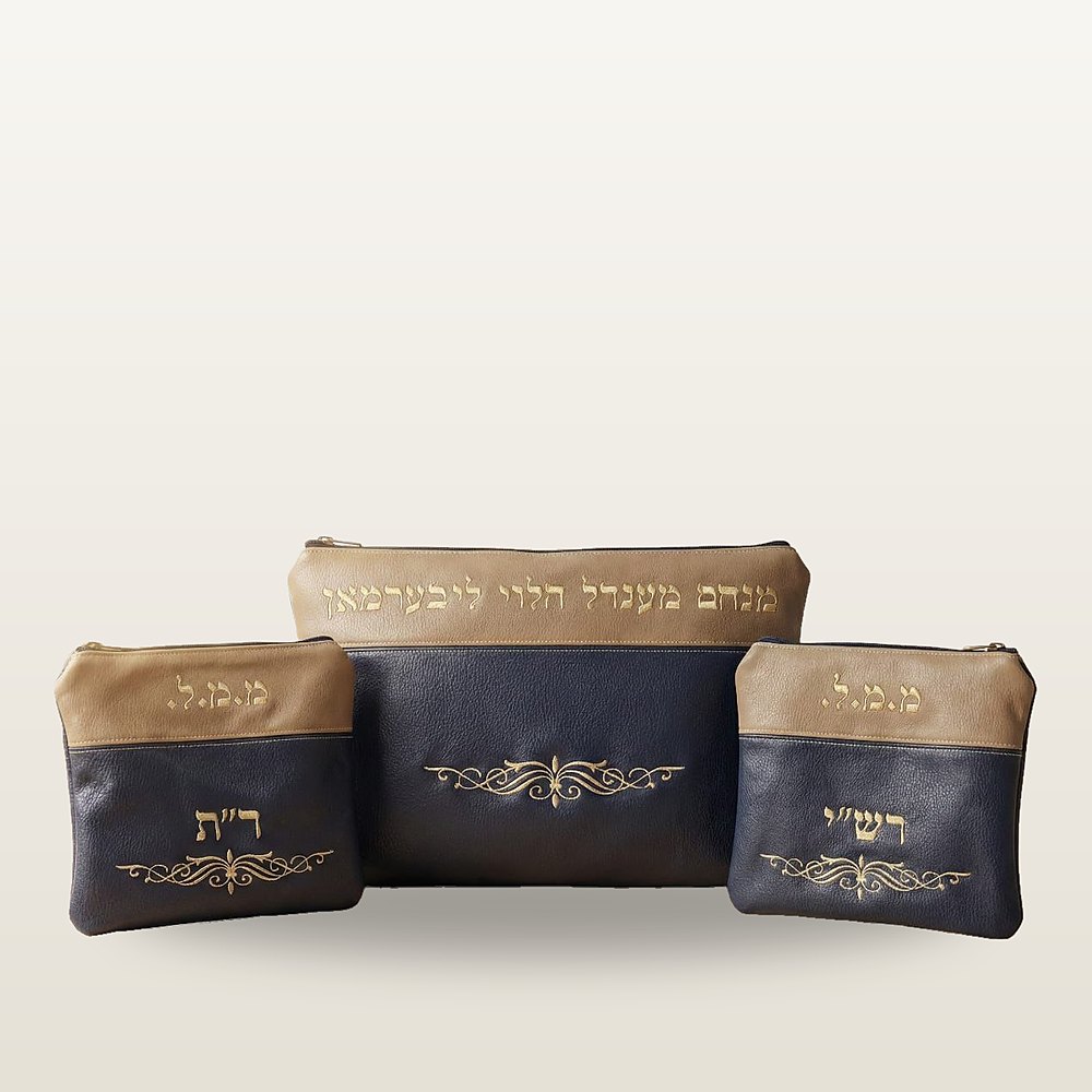 תיק טלית ושני נרתיקי תפילין בעור כחול עמוק וקאמל, עם רקמת זהב ועיטור מסולסל