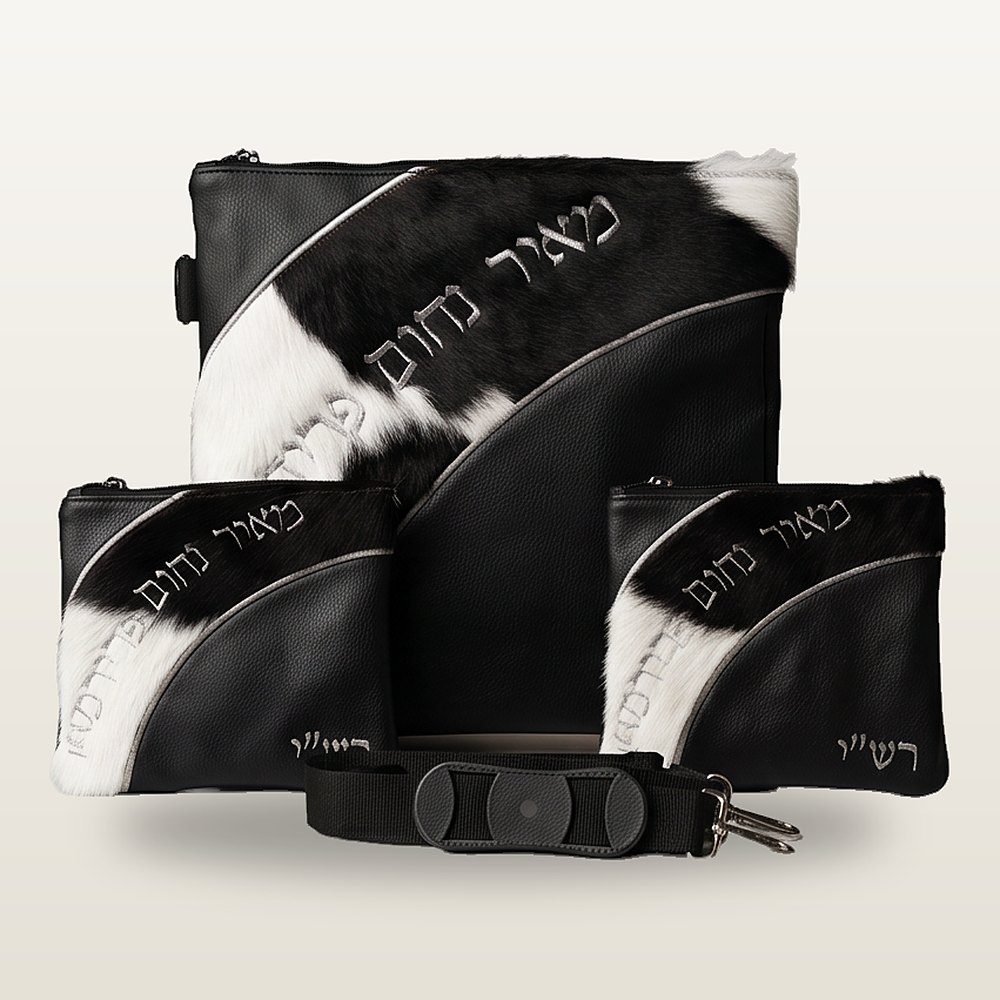 תיק טלית ושני נרתיקי תפילין מעור שחור עם פס אלכסוני של פרווה בשחור-לבן, רקמה בחוטי כסף ורצועת כתף