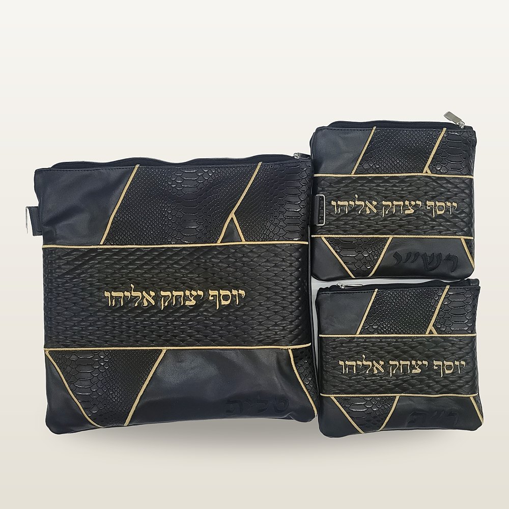תיק טלית ושני נרתיקי תפילין מעור שחור עם משטחי טקסטורת נחש, קווי זהב גיאומטריים ורקמת שם בזהב
