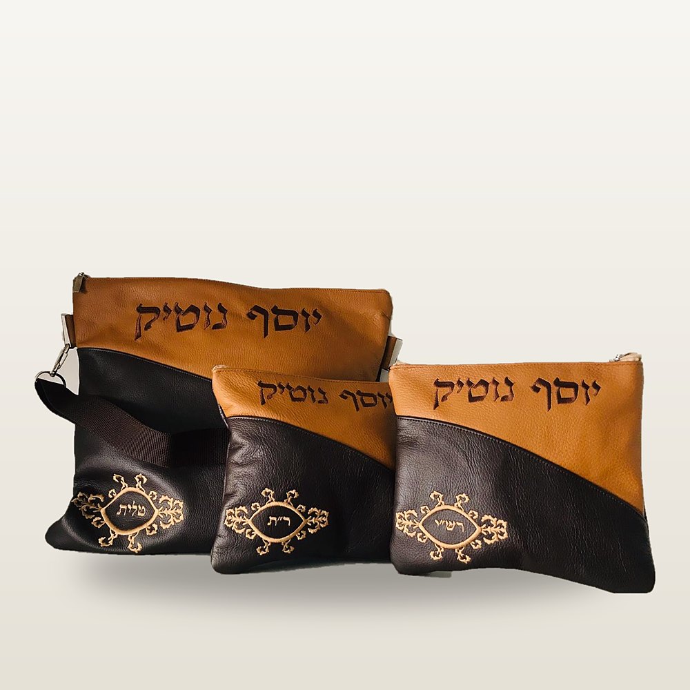 תיק טלית ושני נרתיקי תפילין מעור בחום כהה וקוניאק, חלוקה באלכסון ומדליוני רקמת זהב מעוטרים